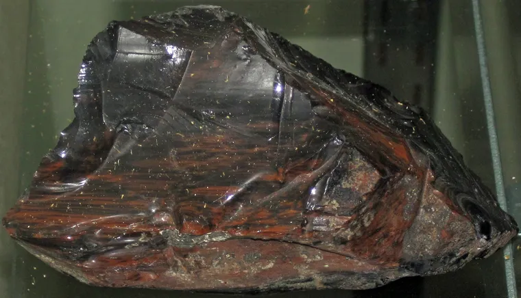 Mahogany obsidian from Glass Butte, Oregon: black volcanic glass with red-brown streaks